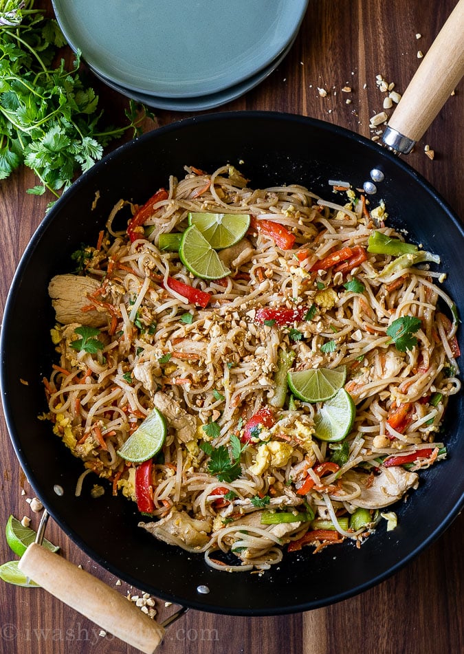 This super easy Chicken Pad Thai Recipe is filled with tender strips of chicken breast, saucy rice noodles and loads of veggies in a quick and easy sauce. 