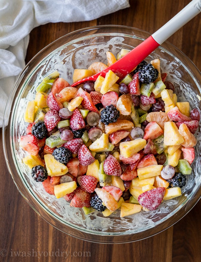 Tossed fruit salad in a large bowl