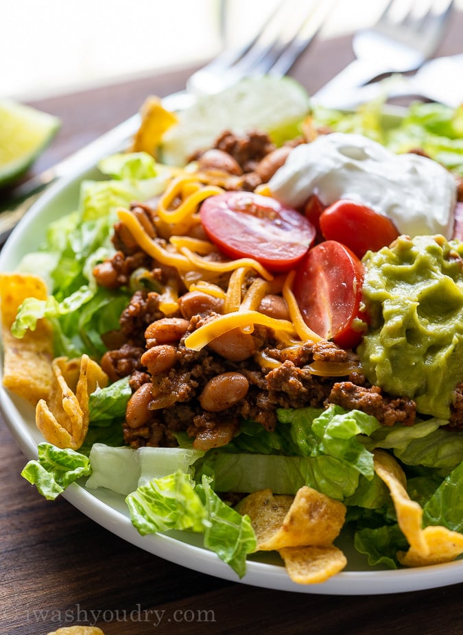 Close up of taco salad on white plate