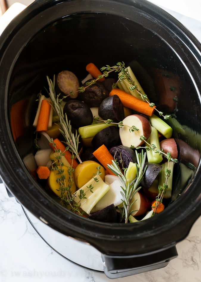 Potato and Veggie Nest in slow cooker for whole chicken to sit on top of.