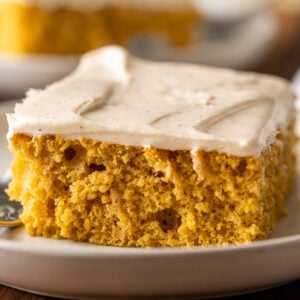 A plate of pumpkin cake with fork