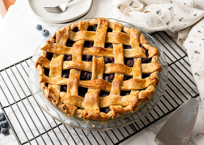 blueberry pie on a cooling rack