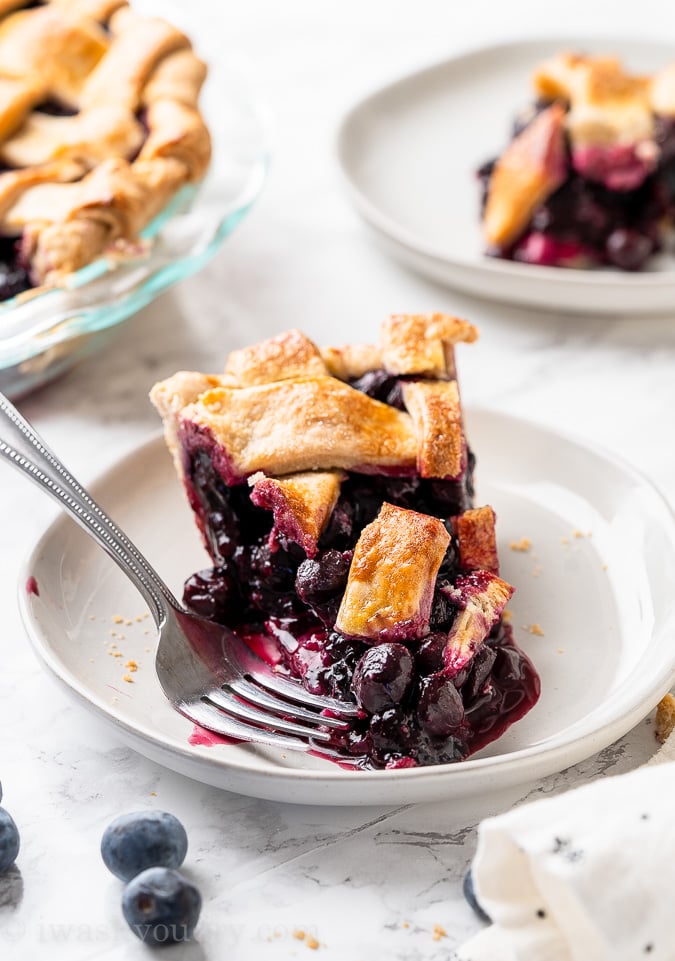 sliced of pie with blueberries