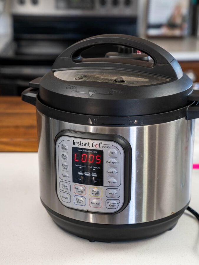 instant pot on counter with timer showing 5