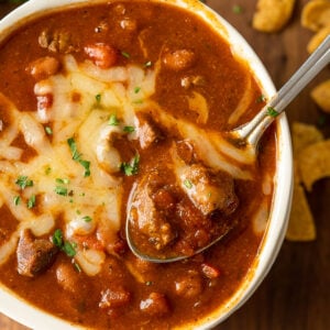 Beef chili in a bowl with spoon