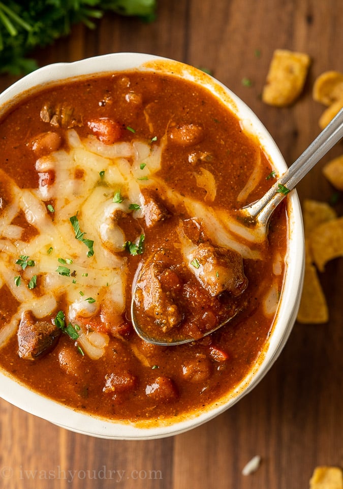 Beef chili in a bowl with spoon