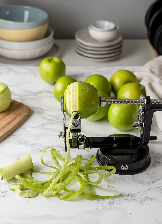 peeling apples on cutting board