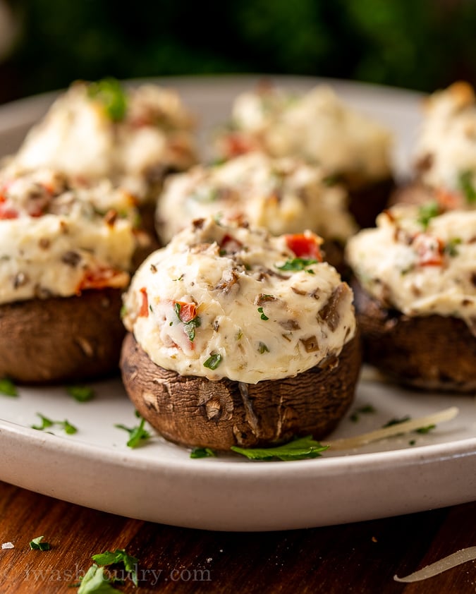 stuffed mushrooms on a white plate