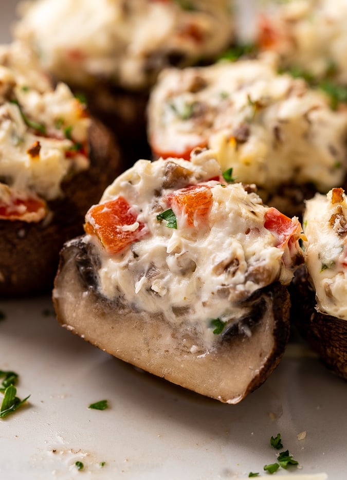 stuffed mushroom on plate with cream cheese