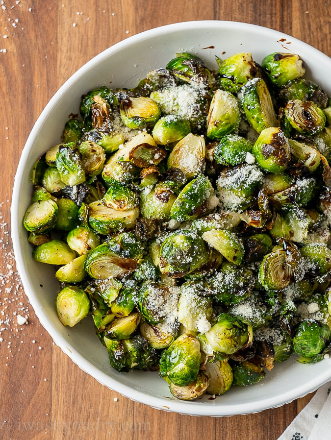 parmesan brussels sprouts in a white bowl