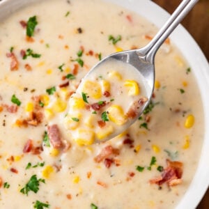 spoonful of corn chowder in bowl
