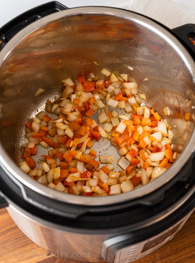 diced peppers and onions in pressure cooker