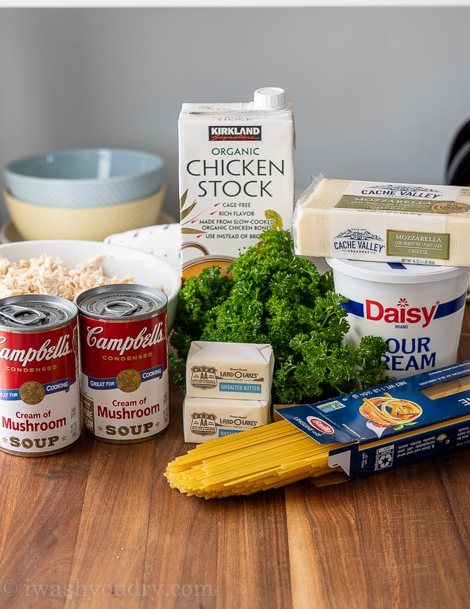 ingredients for chicken tetrazzini on wood table