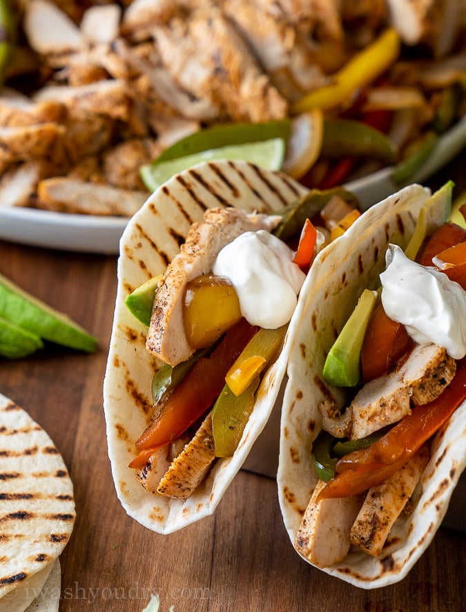 chicken and peppers in tortilla with sour cream