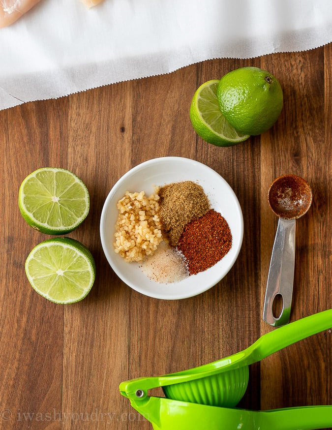 chicken fajita marinade ingredients on cutting board