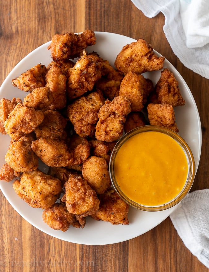 plate with chicken nuggets and dipping sauce