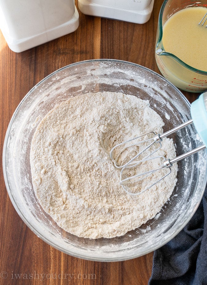 mixing dry ingredients with softened butter
