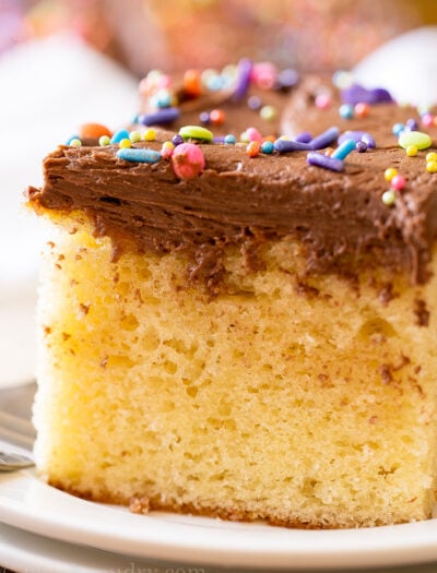 close up picture of vanilla cake with frosting