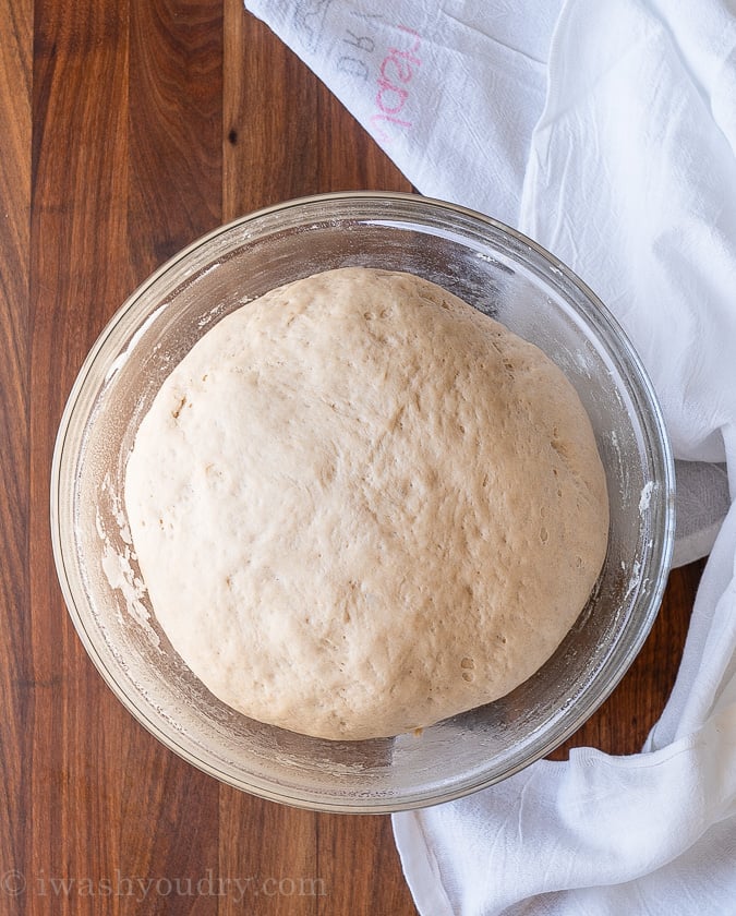 risen dough in bowl