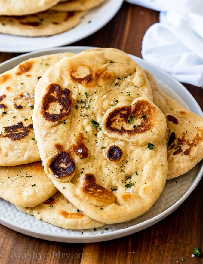 naan bread on plate with herbs and sea salt