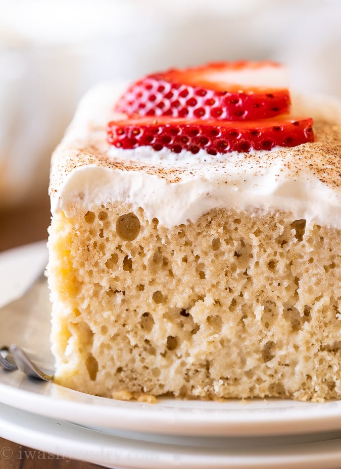 Tres Leches Cake recipe with whipped cream and strawberries