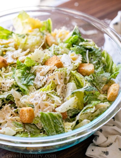 bowl of salad with pasta and dressing