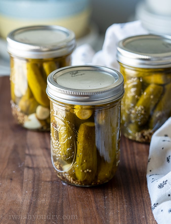jars of pickles with lids on table