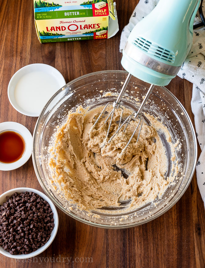 Creaming butter and brown sugar in a mixing bowl