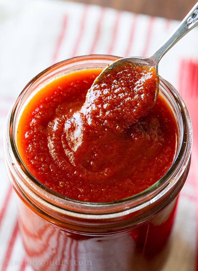 homemade honey bbq sauce in jar with spoon