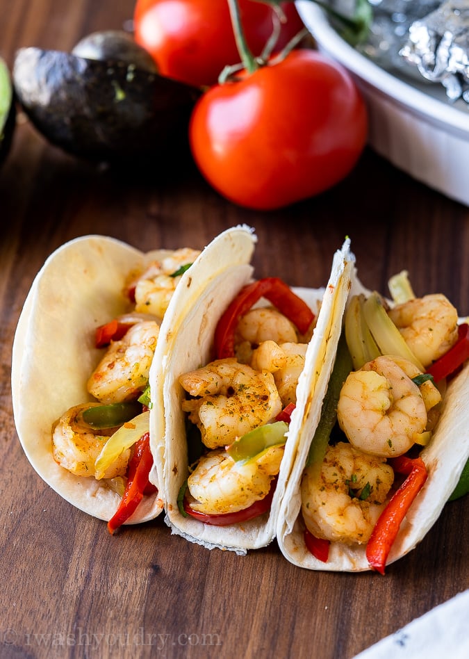 fajitas with shrimp and peppers in tortillas