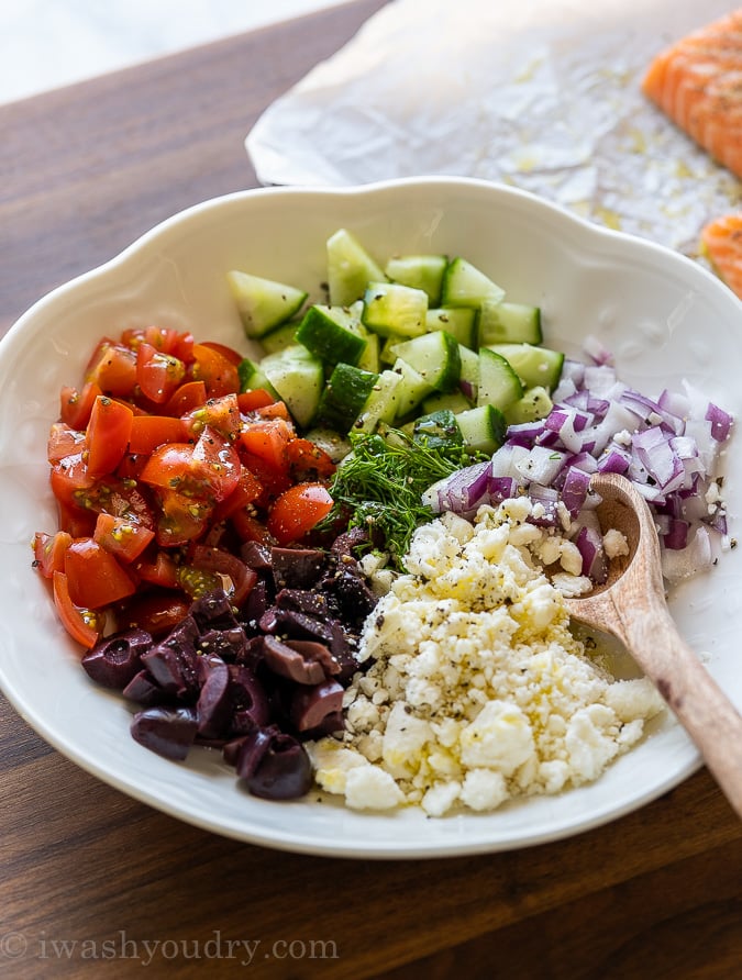 ingredients needed for greek salsa in white bowl