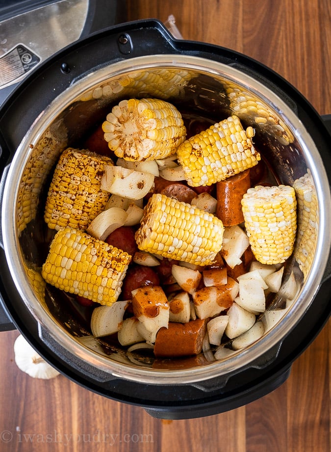 close-up of shrimp boil recipe with potatoes, sausage, and corn