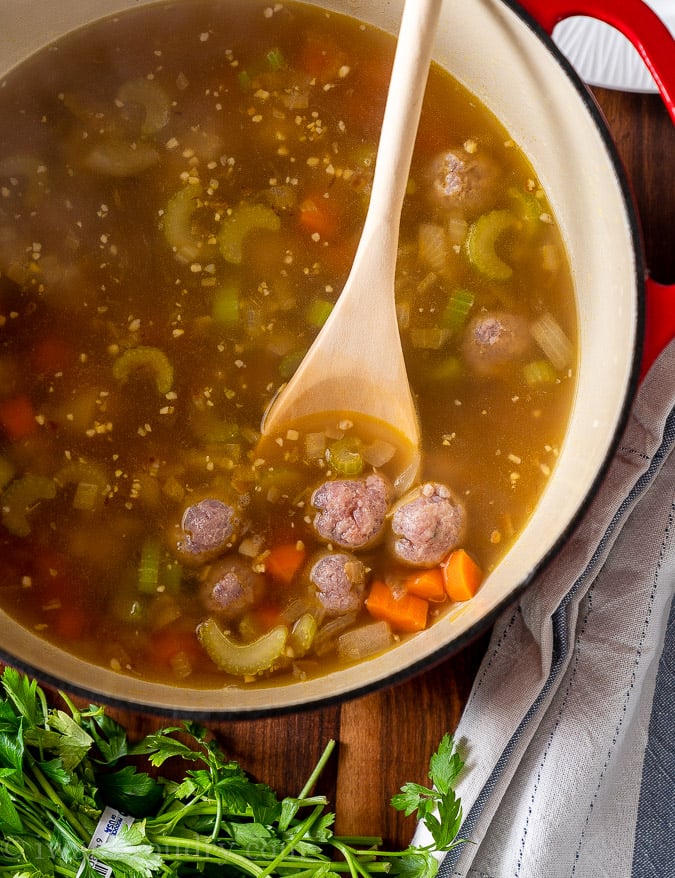 broth and meatballs with vegetables in soup