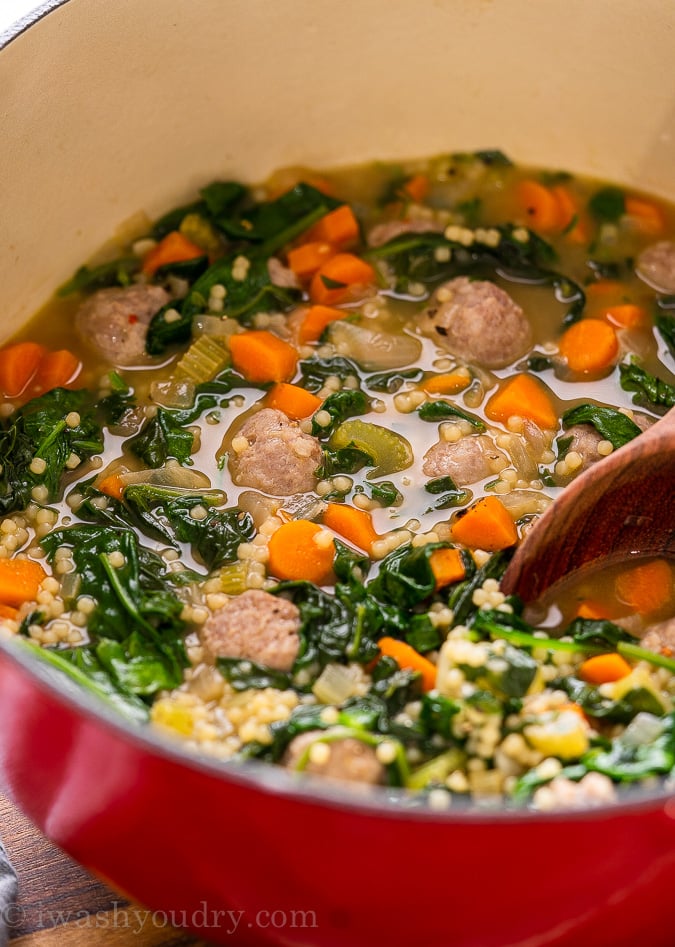 Italian Wedding Soup with spinach and pasta in pot