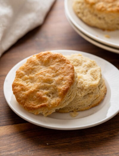 cut biscuit on white plate