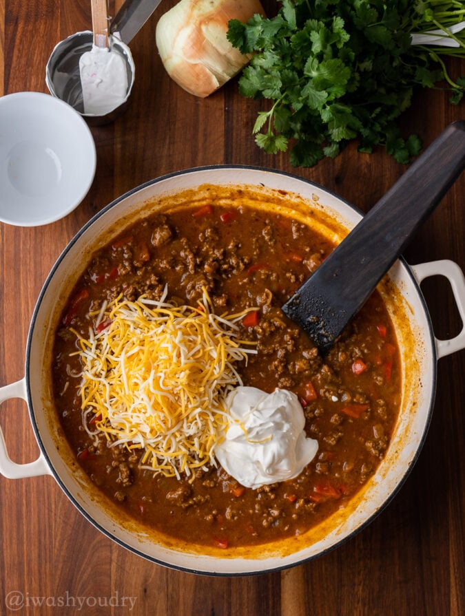 saucy ground beef mixture with sour cream and cheese