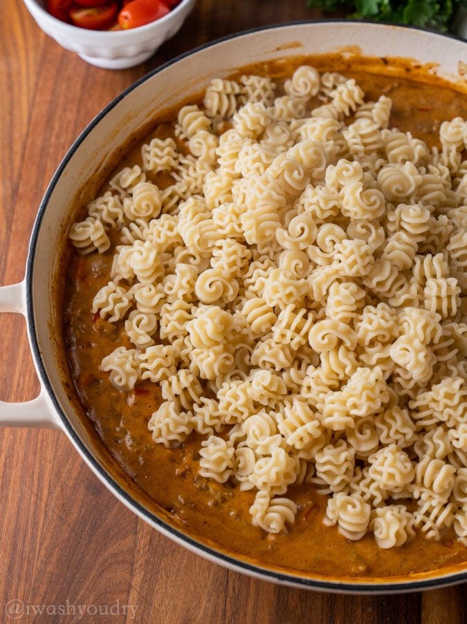 cooked pasta in a creamy, cheesy sauce