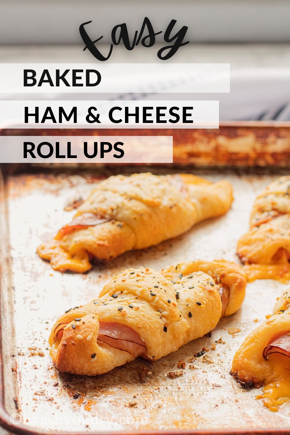 Baked Ham an Cheese Roll Ups on baking sheet with text overlay. 