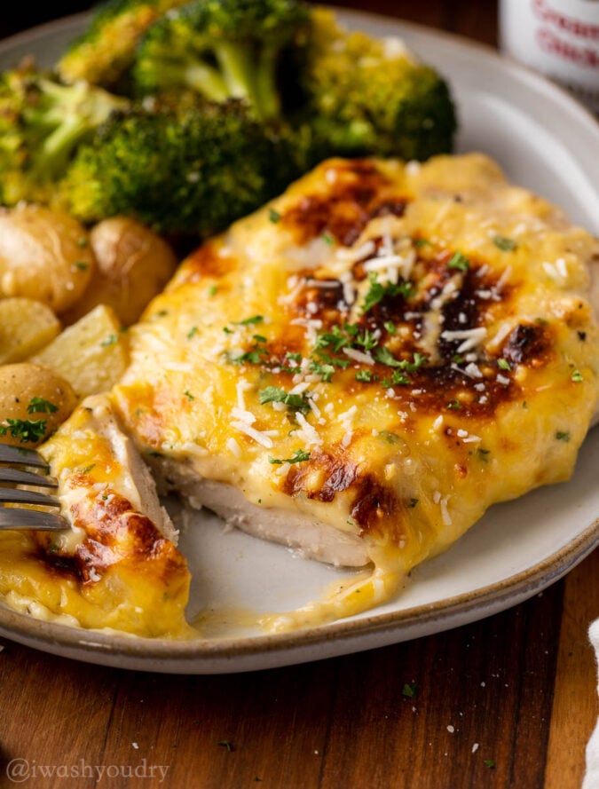 slice of chicken on plate with fork