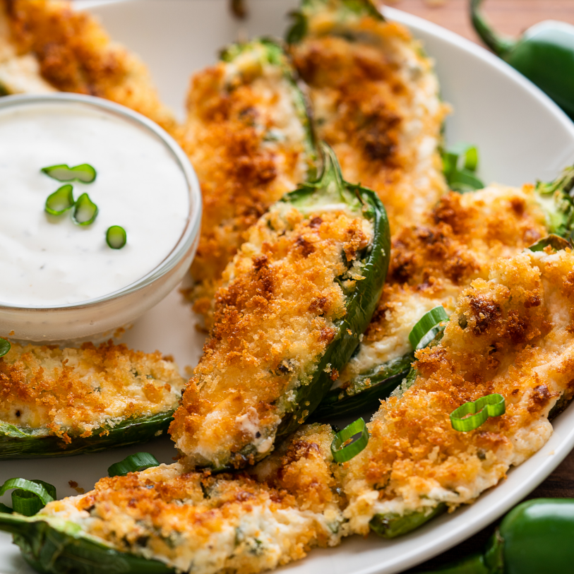 jalapeno poppers on plate with ranch