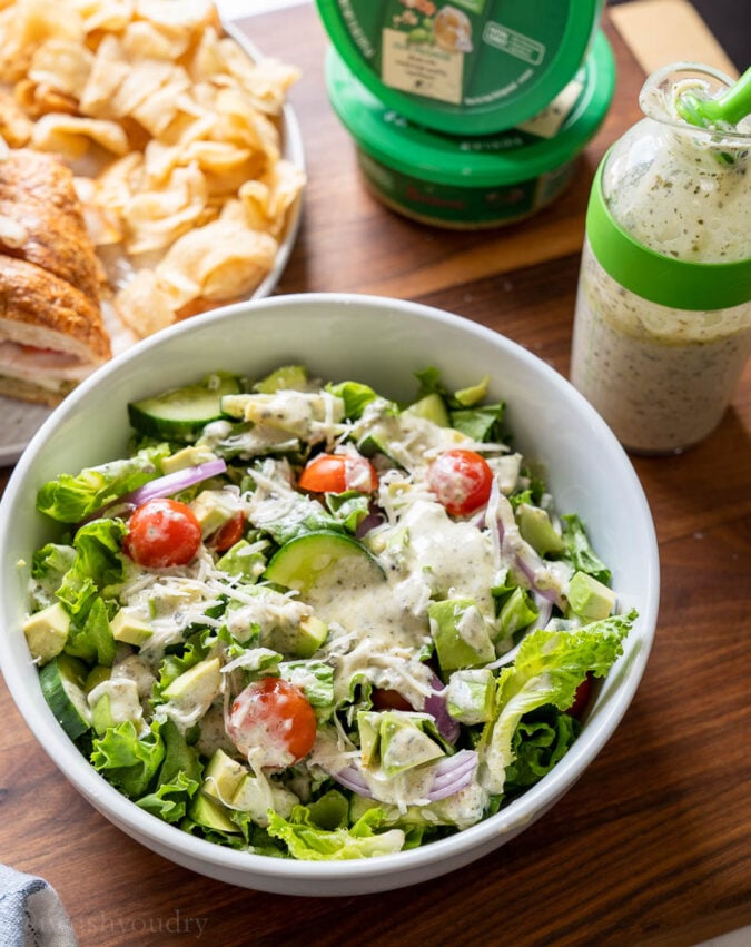 bowl of salad with dressing