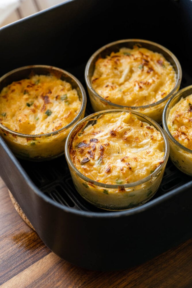 cooked au gratin potatoes in air fryer with cheese.
