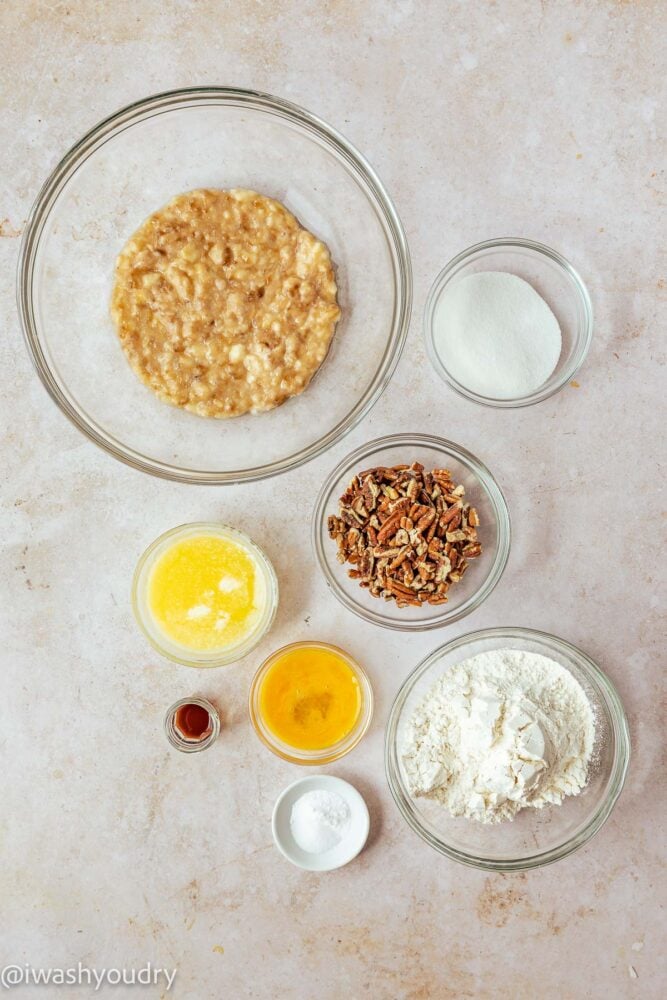 ingredients for banana bread on white surface