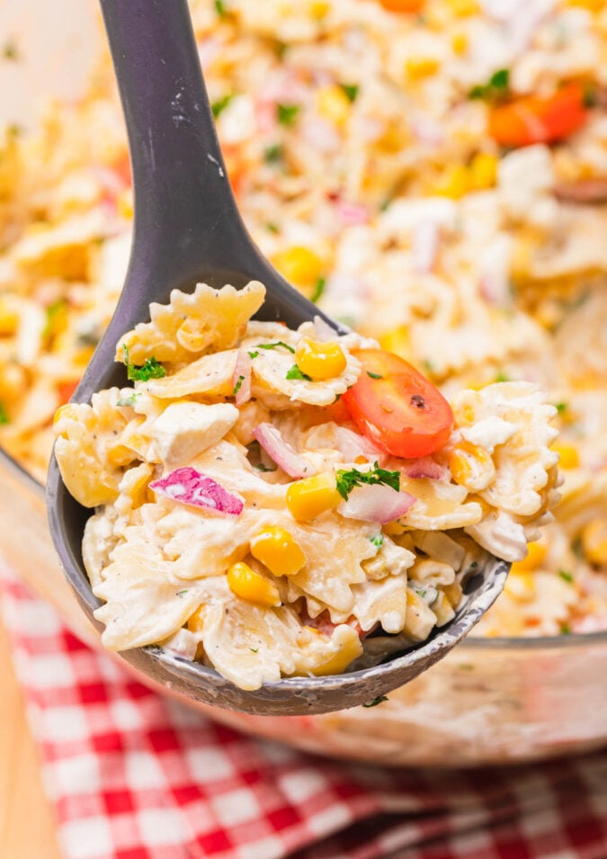 spoonful of pasta salad with corn