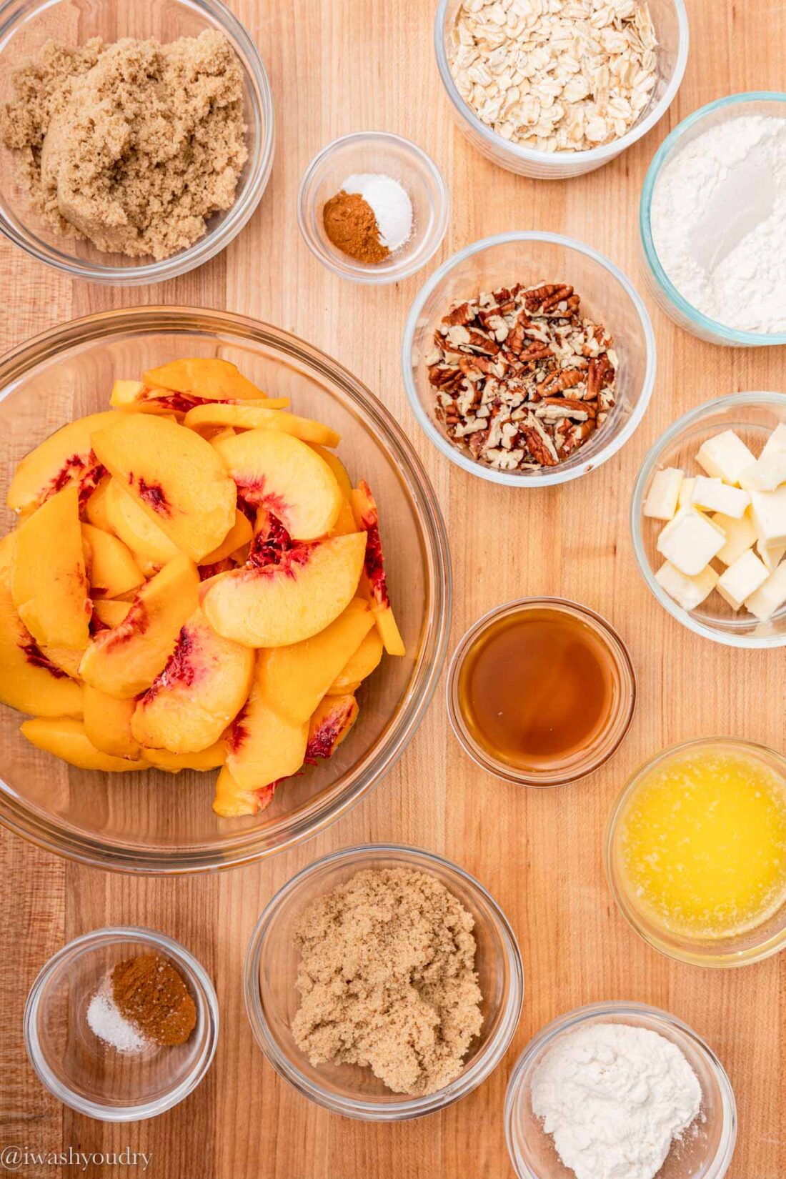 Easy Peach Crisp Ingredients on wood counter. 