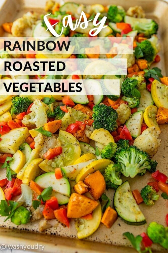 Roasted rainbow vegetables in a metal baking dish.