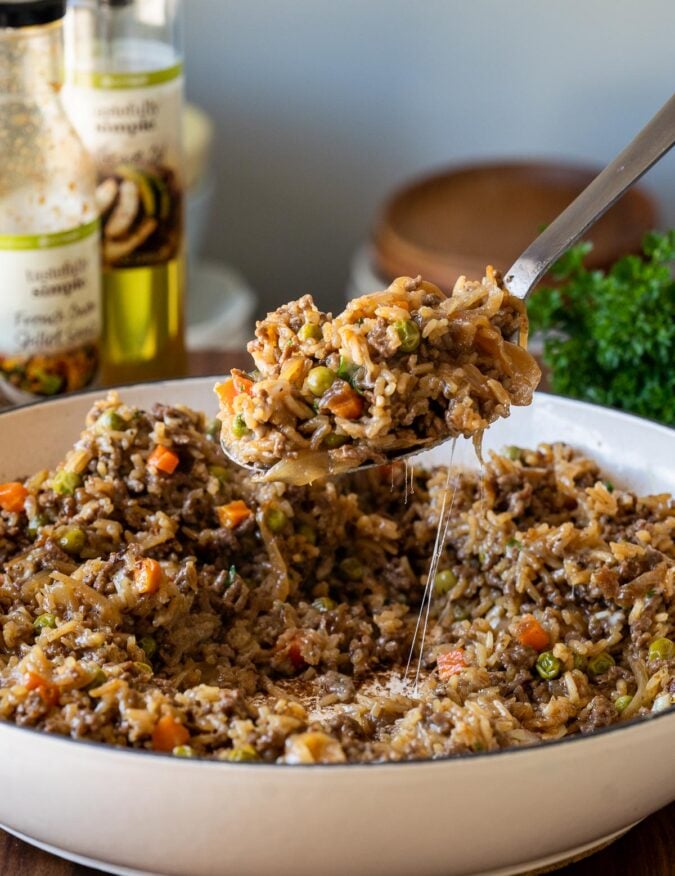 spoonful of French Onion Beef Rice Casserole with cheese