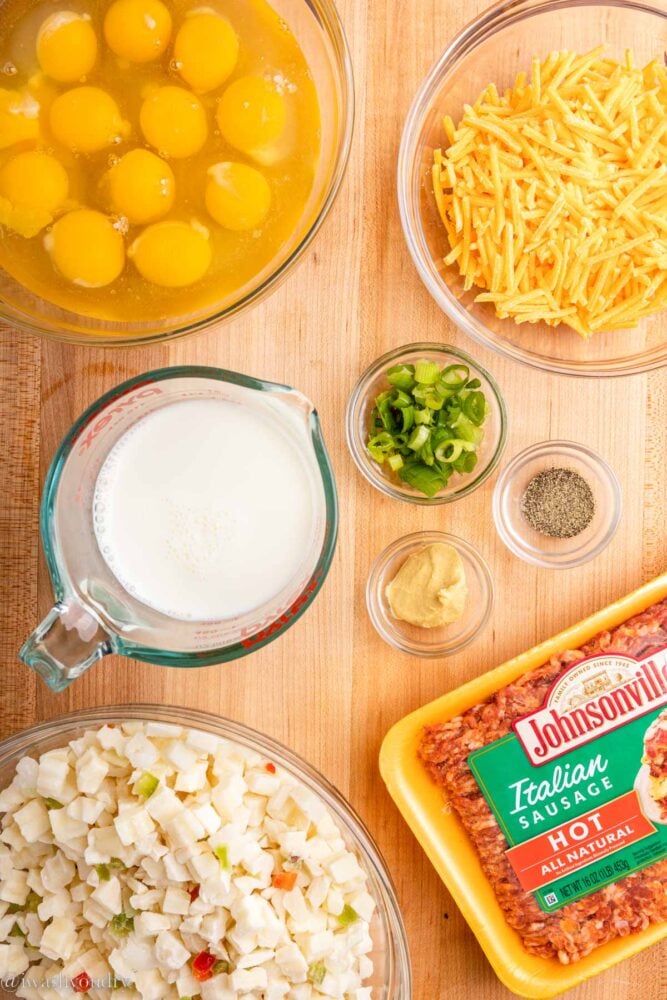 ingredients for breakfast casserole on wooden surface