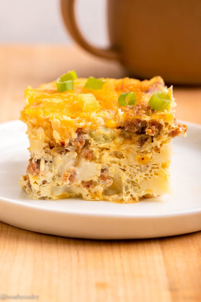 white plate with overnight sausage hash brown casserole