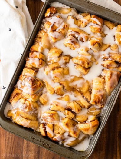 cinnamon roll bake with apples and icing for an easy breakfast.